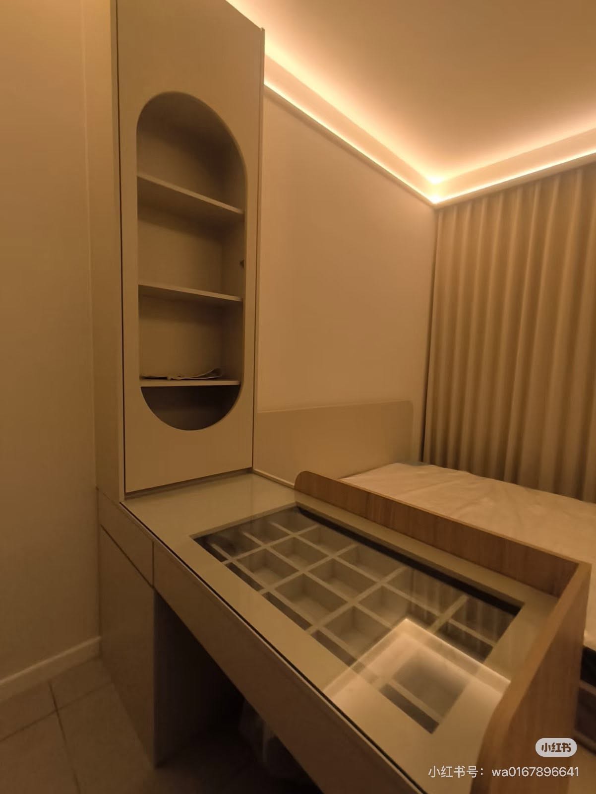 Dressing table with glass-top jewellery drawer and curved niche shelving